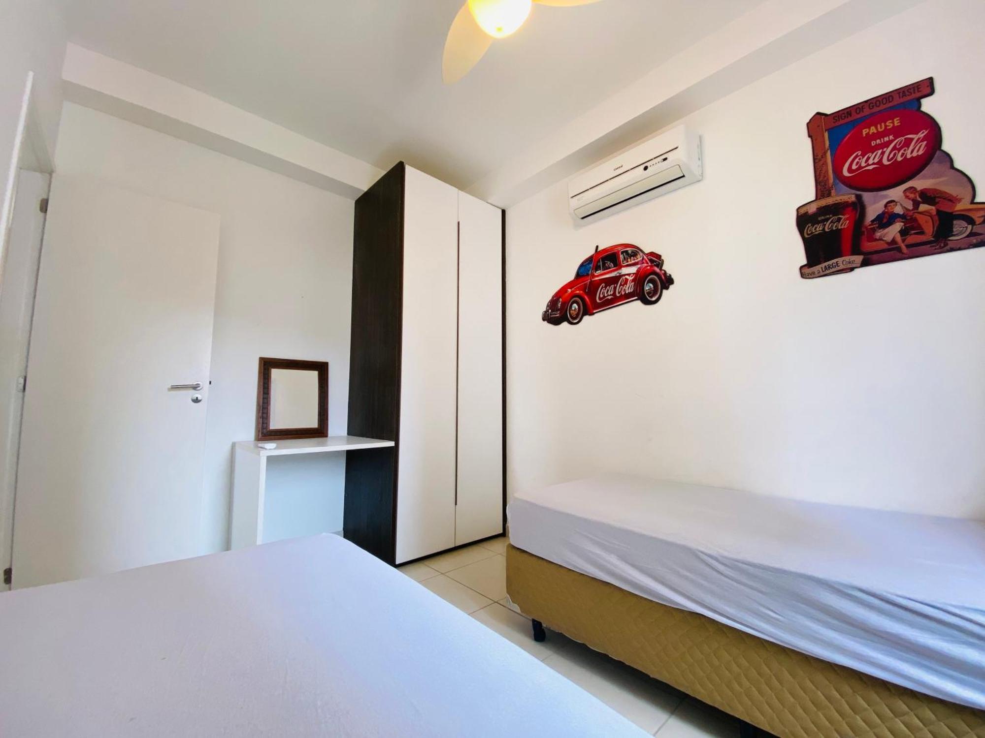 Em Da Enseada Apartment *